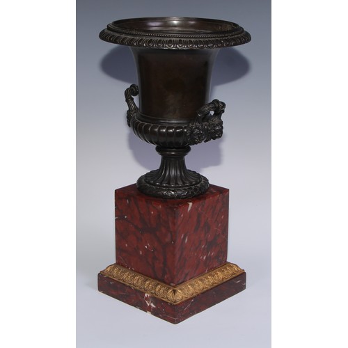 1267 - A pair of 19th century brown patinated bronze half-fluted campana urns, everted egg-and-dart rims, w... 