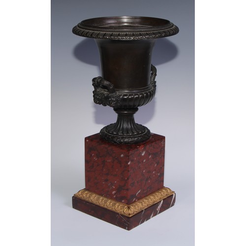 1267 - A pair of 19th century brown patinated bronze half-fluted campana urns, everted egg-and-dart rims, w... 