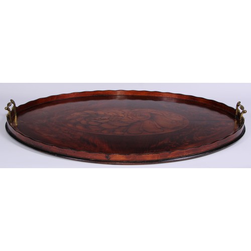 1069 - A 19th century rosewood crossbanded mahogany and marquetry oval gallery tray, wavy border, the field... 