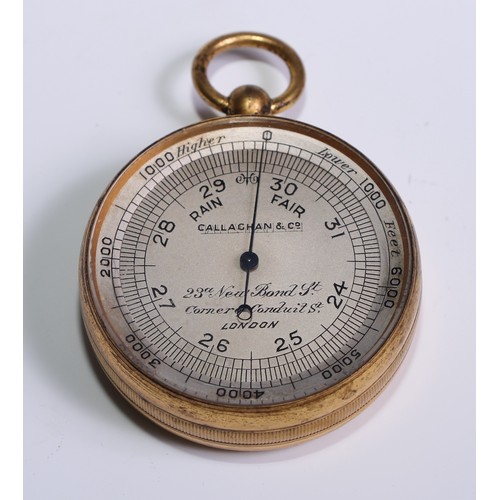 1154 - An early 20th century gilt brass travelling pocket aneroid barometer and compass, 4cm silvered regis... 