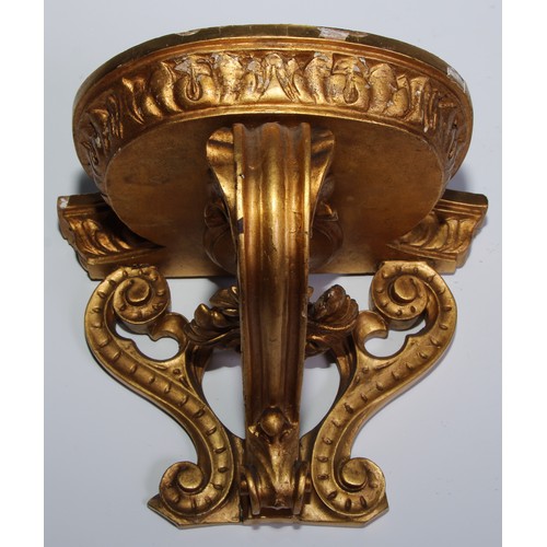 1386 - A pair of 19th century giltwood and gesso wall brackets, bowed plateau with acanthus border, above a... 