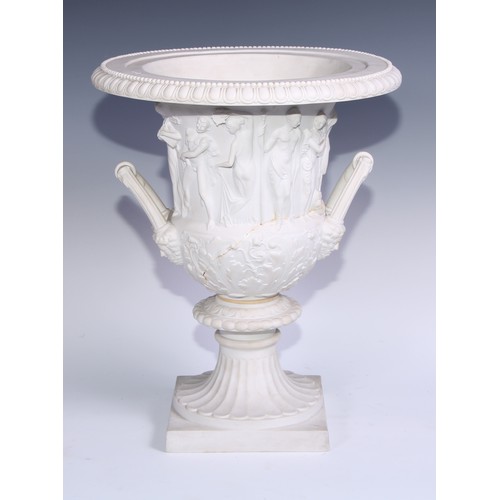 1066 - A 19th century bisque porcelain campana urn, moulded after the antique in the Grand Tour taste, squa... 