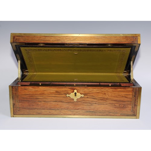 1257 - A large Regency rosewood rectangular campaign writing box, the hinged cover ratchet-adjustable for r... 