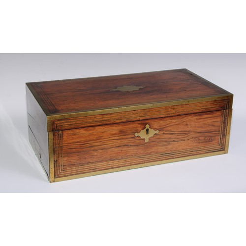 1257 - A large Regency rosewood rectangular campaign writing box, the hinged cover ratchet-adjustable for r... 