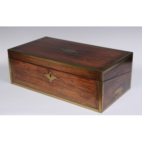 1257 - A large Regency rosewood rectangular campaign writing box, the hinged cover ratchet-adjustable for r... 