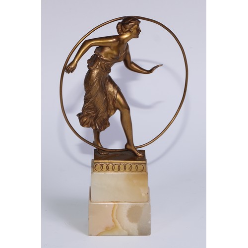 1214 - Georges Morin (1874 - 1950), an Art Deco gilt bronze, Hoop Dancer, signed in the maquette, stepped o... 