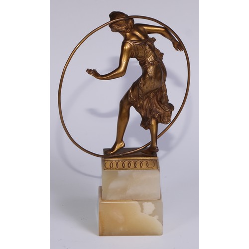 1214 - Georges Morin (1874 - 1950), an Art Deco gilt bronze, Hoop Dancer, signed in the maquette, stepped o... 