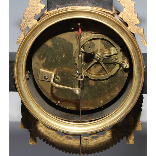 981 - A French Empire gilt bronze mounted black noir marble mantel clock, in the Egyptian Revival taste, 1... 