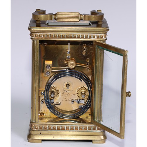 985 - A French porcelain mounted lacquered brass carriage clock, 7cm dial inscribed with Roman numerals, t... 