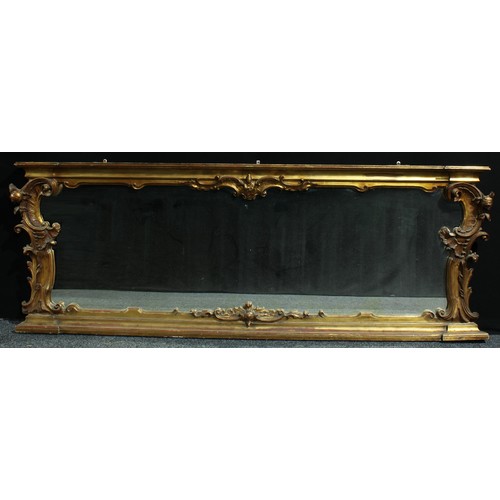 1357 - A substantial 19th century giltwood and gesso overmantel pier glass, concave frieze centred by the f... 