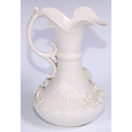 390 - A Belleek ewer, in the white and typically encrusted with flowers, 23.5cm high, second mark, c.1891 ... 