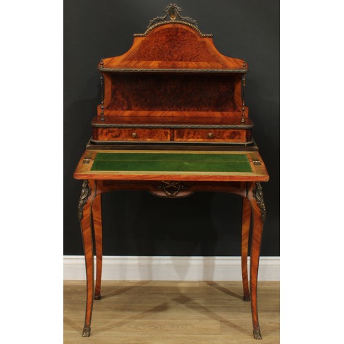 1345 - A Louis XV Revival gilt metal mounted bonheur du jour, shaped superstructure with a shallow shelf an... 