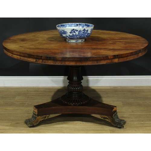 1414 - A Post-Regency gilt metal mounted rosewood and brass marquetry centre table, circular tilting top, t... 