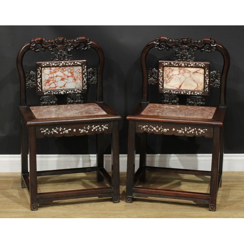 1377 - A pair of Chinese hardwood and mother of pearl marquetry chairs, each with a shaped cresting rail ca... 