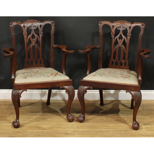 1380 - A pair of Chippendale Revival mahogany elbow chairs, serpentine cresting rails, shaped and pierced s... 