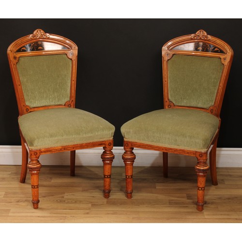 1410 - A pair of Victorian walnut and marquetry side chairs, each with shaped cresting rail carved with a s... 