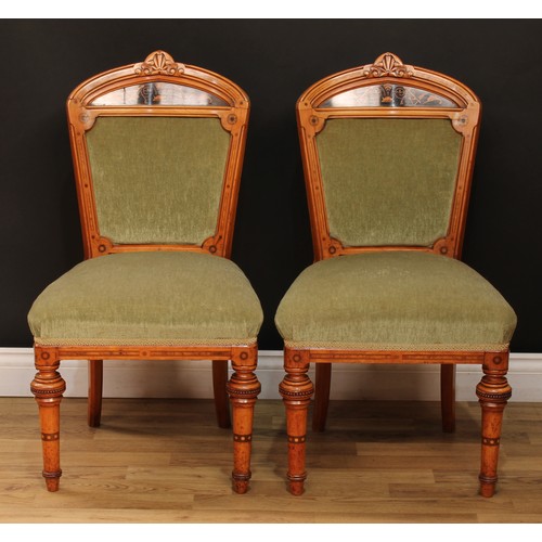 1410 - A pair of Victorian walnut and marquetry side chairs, each with shaped cresting rail carved with a s... 