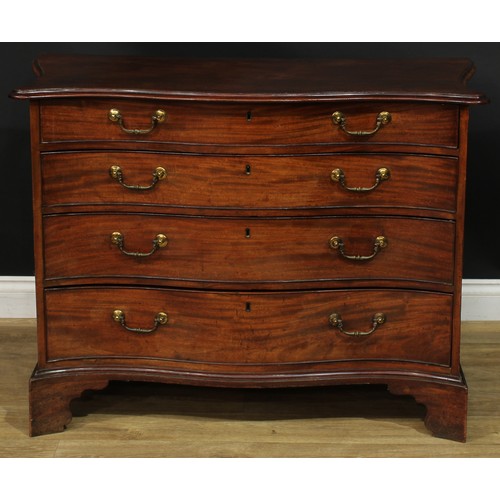 1227 - A George III mahogany serpentine chest, slightly oversailing top with moulded edge above four long g... 