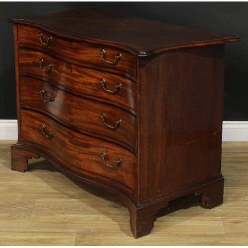 1227 - A George III mahogany serpentine chest, slightly oversailing top with moulded edge above four long g... 