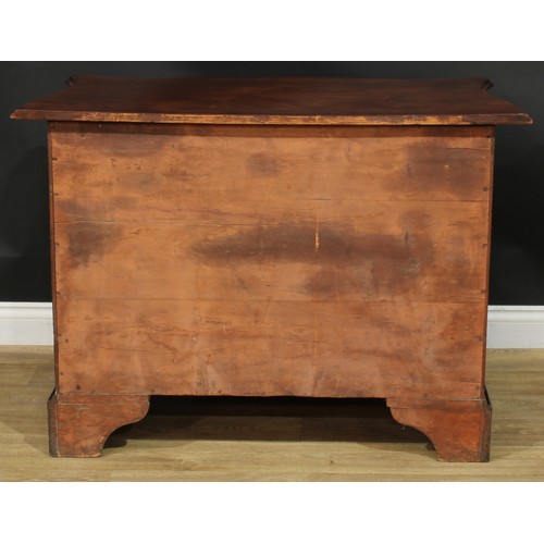 1227 - A George III mahogany serpentine chest, slightly oversailing top with moulded edge above four long g... 