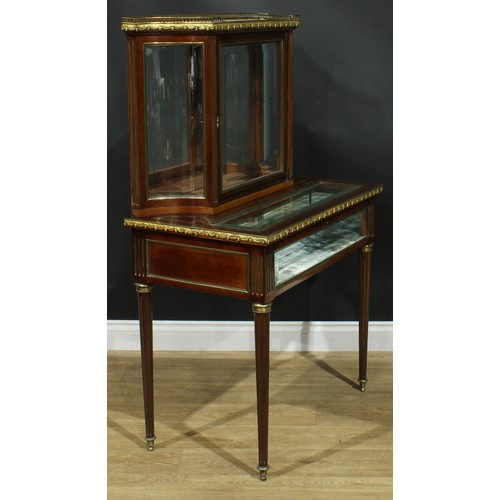 1352 - A Louis XVI Revival gilt metal mounted connoisseur’s vitrine, incurve superstructure with marble top... 