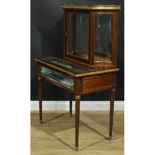 1352 - A Louis XVI Revival gilt metal mounted connoisseur’s vitrine, incurve superstructure with marble top... 