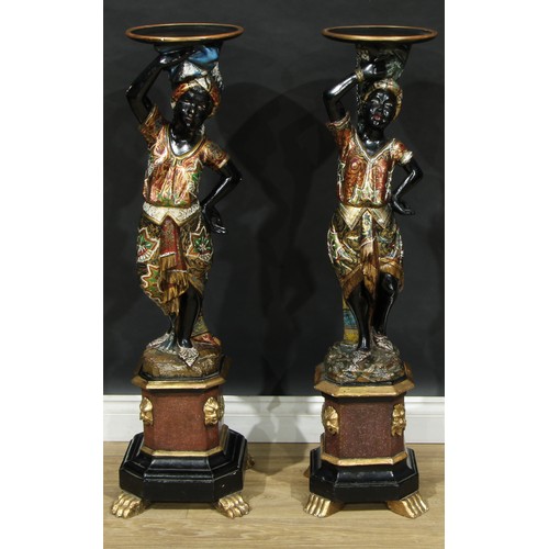 1368 - A near pair of Venetian parcel-gilt and polychrome painted blackamoor torcheres, each carved as a Nu... 