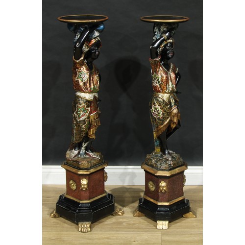 1368 - A near pair of Venetian parcel-gilt and polychrome painted blackamoor torcheres, each carved as a Nu... 