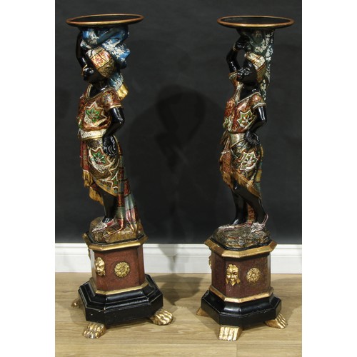 1368 - A near pair of Venetian parcel-gilt and polychrome painted blackamoor torcheres, each carved as a Nu... 