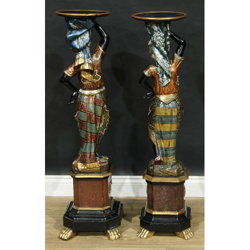 1368 - A near pair of Venetian parcel-gilt and polychrome painted blackamoor torcheres, each carved as a Nu... 