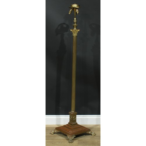 1623 - Interior Design - a brass telescopic floor lamp, Corinthian column, stepped square base, paw feet, 1... 