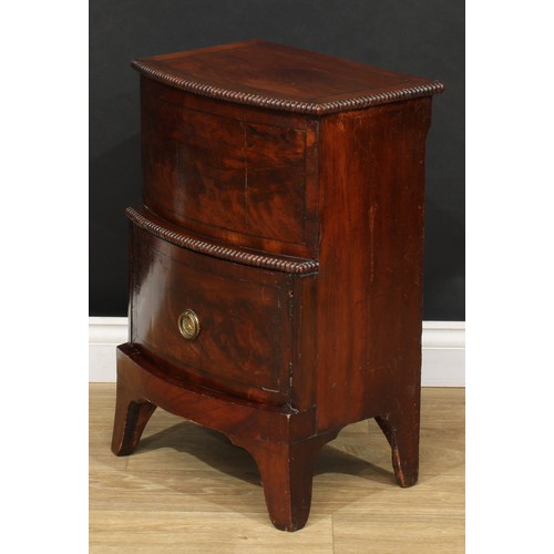 913 - A 19th century mahogany bowfront bedroom cabinet, hinged top with reel-moulded edge above a pot cupb... 