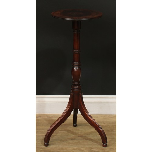 941 - A 19th century mahogany tripod wine table, circular top with channelled edge, turned column, reeded ... 