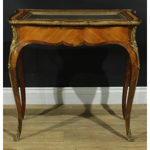 1347 - A Louis XV Revival gilt metal mounted kingwood bijouterie table, shaped rectangular top with inset g... 