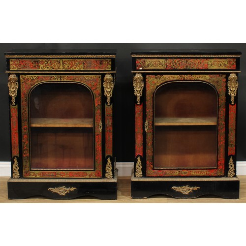 1373 - A pair of 19th century gilt metal mounted Boulle and ebonised pier display cabinets, each with an ov... 