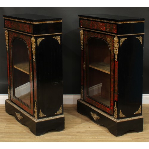 1373 - A pair of 19th century gilt metal mounted Boulle and ebonised pier display cabinets, each with an ov... 