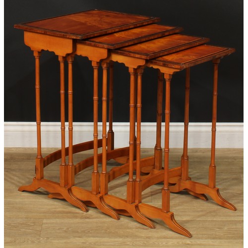 1179 - A George III Revival set of rosewood crossbanded satinwood quartetto tables, each with a rectangular... 