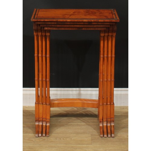 1179 - A George III Revival set of rosewood crossbanded satinwood quartetto tables, each with a rectangular... 