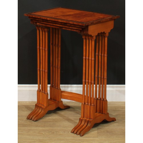 1179 - A George III Revival set of rosewood crossbanded satinwood quartetto tables, each with a rectangular... 