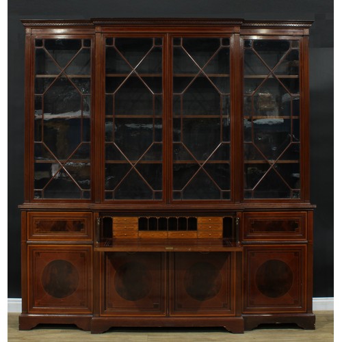 1289 - A large Sheraton Revival satinwood banded, fiddleback and flame accented mahogany breakfront secreta... 