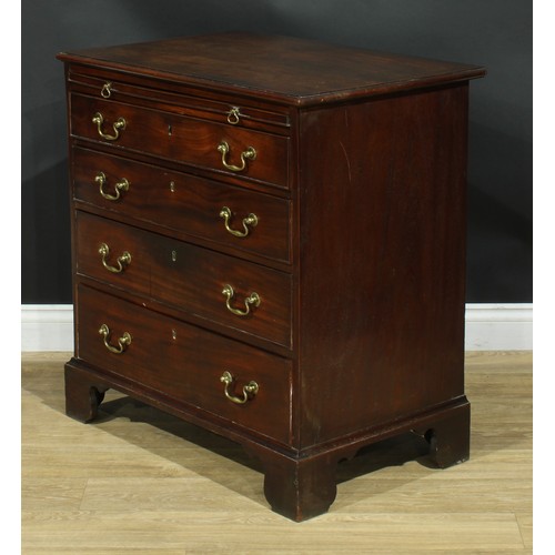 1102 - A George III mahogany bachelor’s chest, rectangular top with moulded edge above a slide and four lon... 