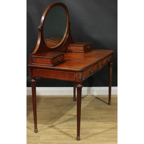 1355 - A Louis XVI Revival satinwood crossbanded coiffeuse or dressing table, the superstructure with bevel... 