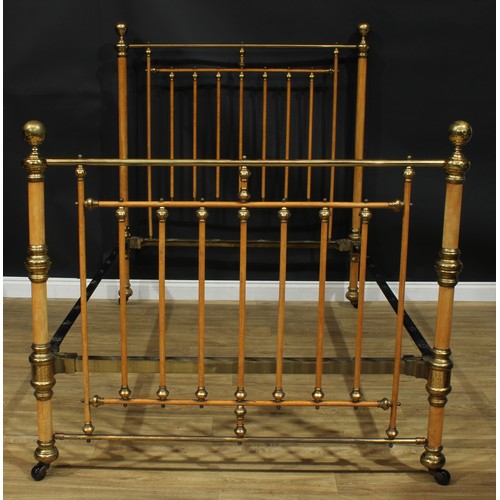 1619 - An unusual late 19th century brass and birch double bed, globe finials, ceramic casters, the headboa... 