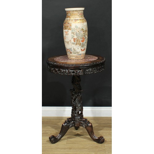 1044 - A Chinese hardwood tripod occasional table, circular top with inset marble panel above a shaped frie... 