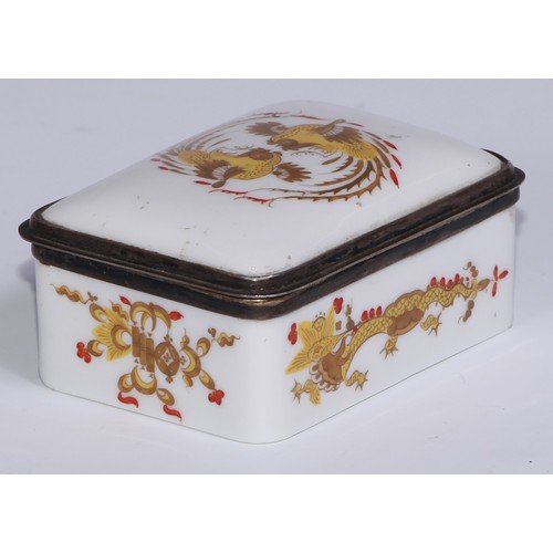 821 - A German silver coloured metal mounted porcelain rounded rectangular snuff box, painted in the Chine... 