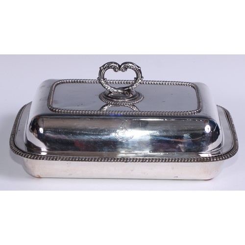 31 - A Regency Old Sheffield Plate rounded rectangular warming entree dish, reeded loop handle, scroll ha... 