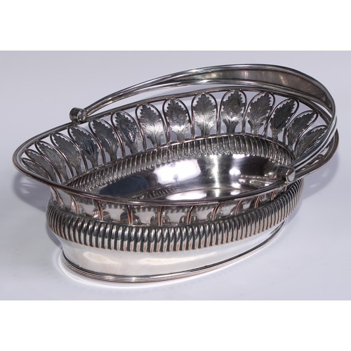 9 - A George III Old Sheffield Plate half-fluted oval swing-handled cake basket, pierced border with bri... 