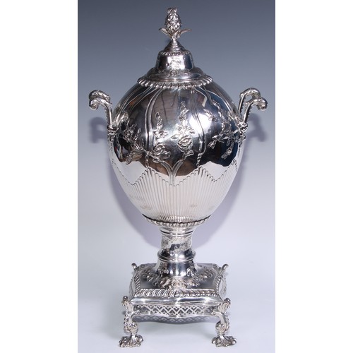 19 - A George III Rococo Old Sheffield Plate ovoid pedestal tea urn or samovar, domed cover with pineappl... 