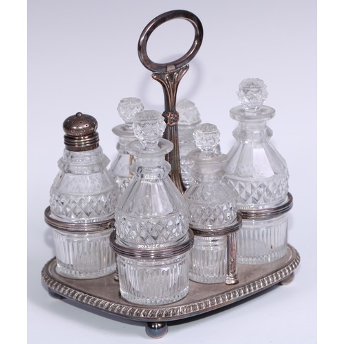 42 - Matthew Boulton - a Regency Old Sheffield Plate rounded rectangular six-bottle cruet, posted handle,... 