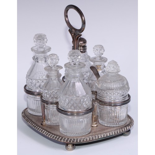 42 - Matthew Boulton - a Regency Old Sheffield Plate rounded rectangular six-bottle cruet, posted handle,... 